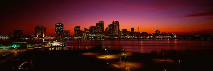 Buildings lit up at night, New Orleans, Louisiana, USA by Panoramic Images wall art