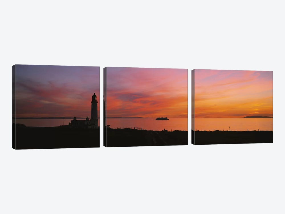 Silhouette of a lighthouse at sunset, Scotland by Panoramic Images 3-piece Canvas Artwork