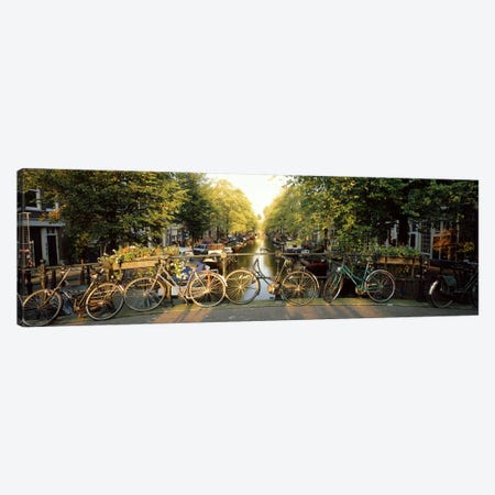 Row Of Bicycles, Amsterdam, Netherlands Canvas Print #PIM2806} by Panoramic Images Canvas Art