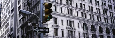 Low angle view of a traffic light in front of a buildingWall Street, New York City, New York State, USA by Panoramic Images framed canvas print