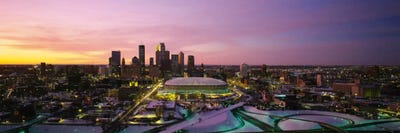 Skyscrapers lit up at sunsetMinneapolis, Minnesota, USA by Panoramic Images canvas print