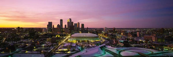 Skyscrapers lit up at sunsetMinneapolis, Minnesota, USA