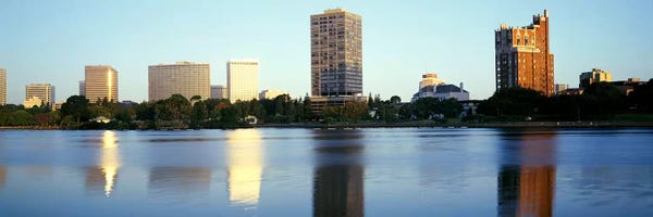 Oakland: Reflection Of Skyscrapers In A Lake, Lake Merritt, Oakland, California, USA by Panoramic Images