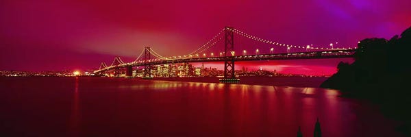 San Francisco Skylines: Suspension bridge lit up at nightBay Bridge, San Francisco, California, USA by Panoramic Images