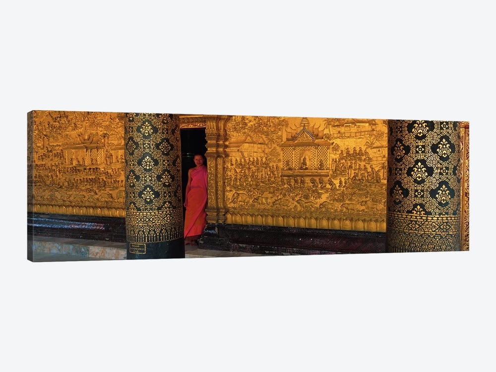 Monk in prayer hall at Wat Mai Buddhist Monastery, Luang Prabang, Laos by Panoramic Images 1-piece Canvas Wall Art