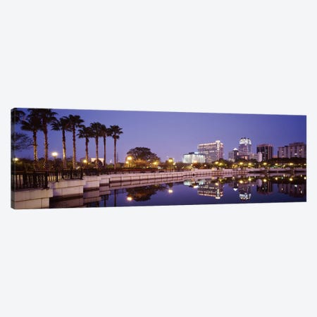 Reflection Of Buildings In The Lake, Lake Luceme, Orlando, Florida, USA Canvas Print #PIM2915} by Panoramic Images Canvas Wall Art