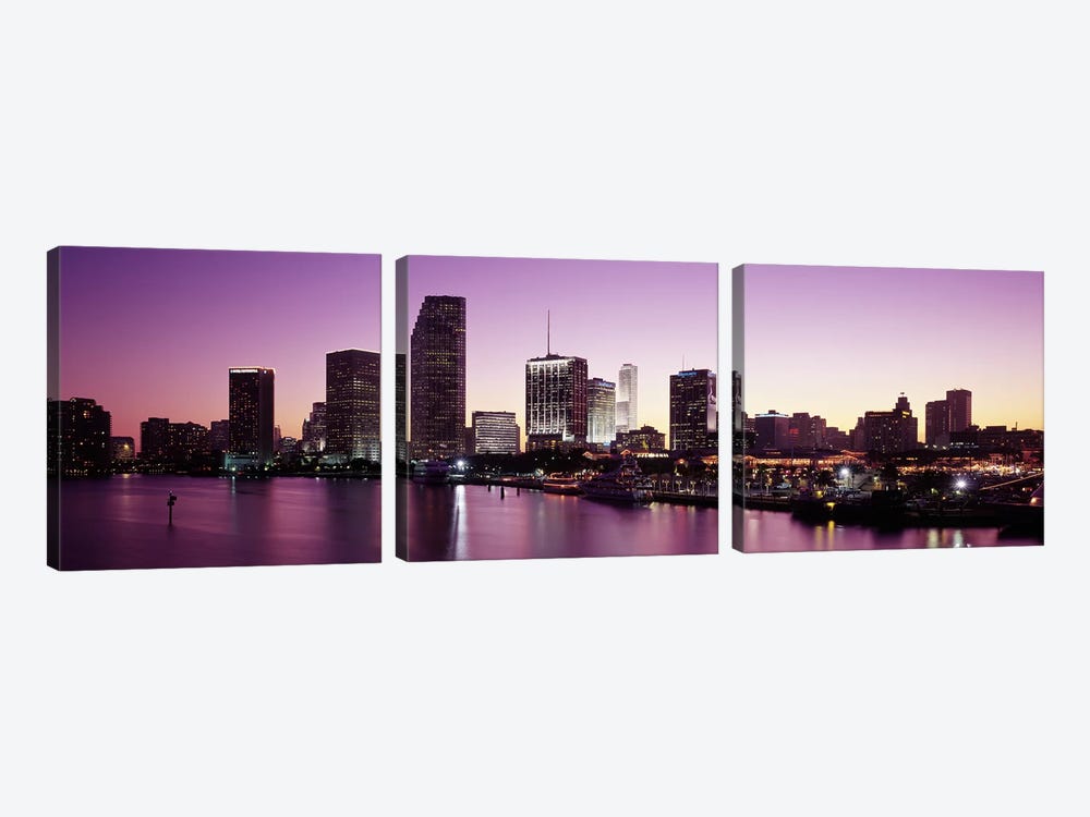 Buildings lit up at duskBiscayne Bay, Miami, Miami-Dade county, Florida, USA by Panoramic Images 3-piece Canvas Art Print
