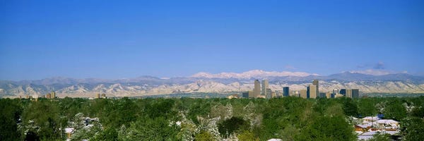 Denver: Buildings in a city with a mountain range in the background, Denver, Colorado, USA by Panoramic Images