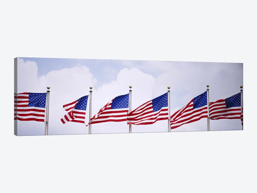 Low angle view of American flags fluttering in wind by Panoramic Images 1-piece Canvas Print