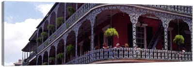 People sitting in a balcony, French Quarter, New Orleans, Louisiana, USA Canvas Art Print - People Art