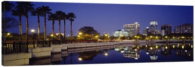 Reflection of buildings in water, Orlando, Florida, USA Canvas Art Print - Orlando Art