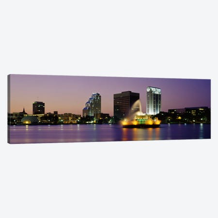Fountain in a lake lit up at night, Lake Eola, Summerlin Park, Orlando, Orange County, Florida, USA Canvas Print #PIM3064} by Panoramic Images Art Print
