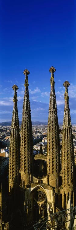 High Section View Of Towers Of A Basilica, Sagrada Familia, Barcelona, Catalonia, Spain