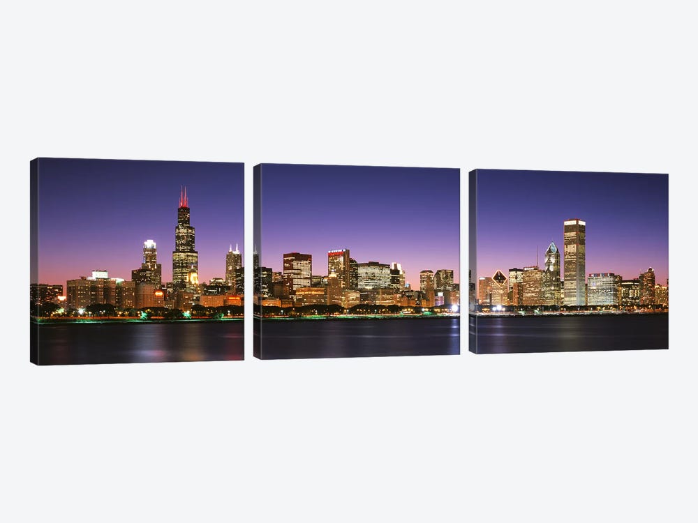 Skyscrapers lit up at night at the waterfront, Lake Michigan, Chicago, Cook County, Illinois, USA by Panoramic Images 3-piece Canvas Art