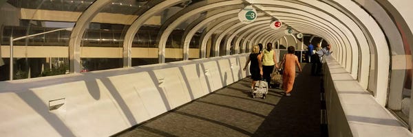 Tunnels: Rear view of tourists walking on a walkway, Atlanta, Georgia, USA by Panoramic Images