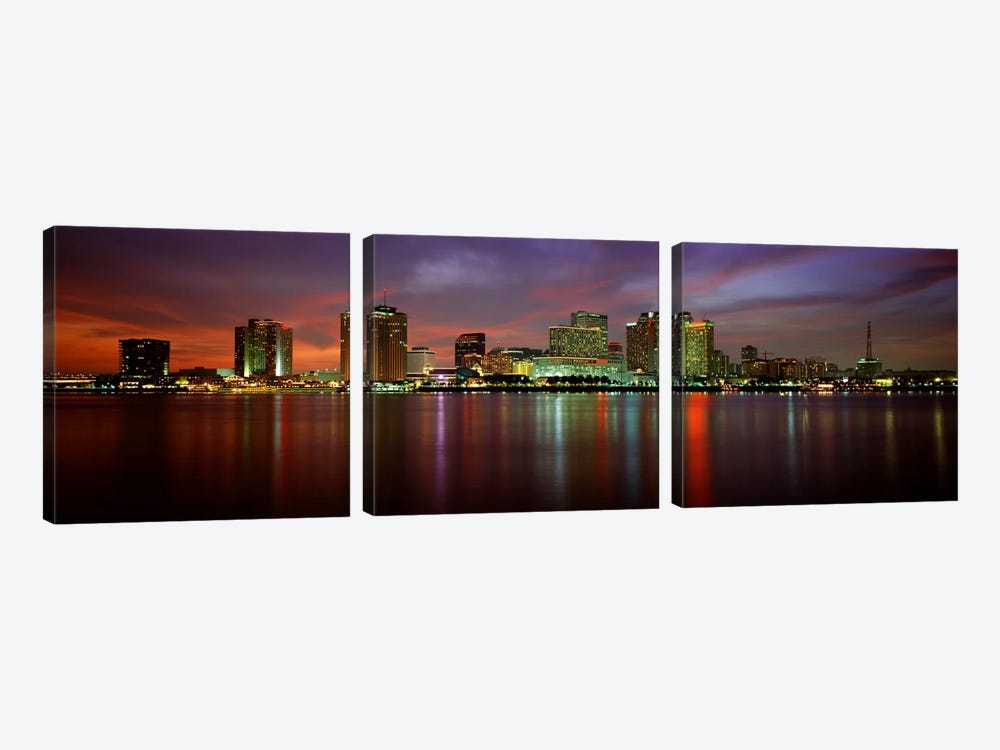 Buildings lit up at the waterfront, New Orleans, Louisiana, USA by Panoramic Images 3-piece Canvas Print