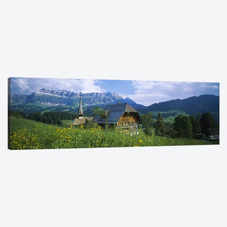 Chalet and a church on a landscape, Emmental, Switzerland Canvas Print #PIM3344} by Panoramic Images Canvas Artwork
