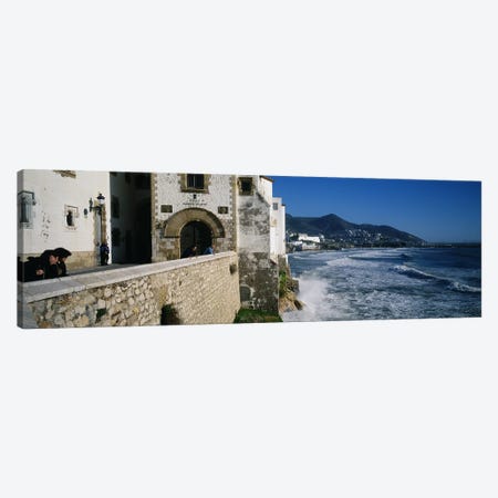 Tourists in a church beside the sea, Sitges, Spain Canvas Print #PIM3382} by Panoramic Images Art Print