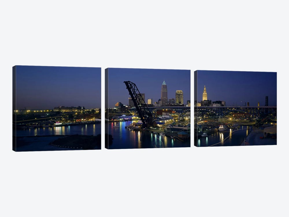 Skyscrapers lit up at night in a cityCleveland, Ohio, USA 3-piece Canvas Print