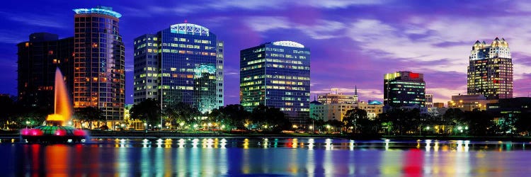 Panoramic View Of An Urban Skyline At Night, Orlando, Florida, USA