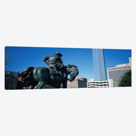 Low Angle View Of A Statue In Front Of Buildings, Dallas, Texas, USA Canvas Print #PIM3473} by Panoramic Images Art Print