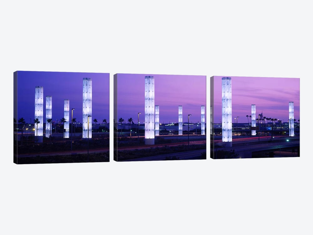 Light sculptures lit up at night, LAX Airport, Los Angeles, California, USA by Panoramic Images 3-piece Canvas Print