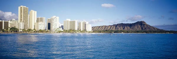 Honolulu: Buildings at the waterfront with a volcanic mountain in the background, Honolulu, Oahu, Hawaii, USA by Panoramic Images