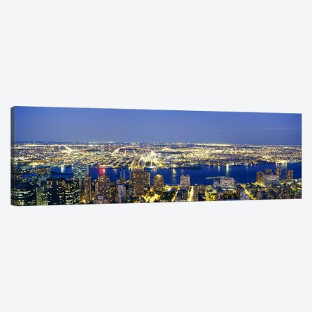 Aerial View of Buildings Lit Up At DuskManhattan, NYC, New York City, New York State, USA Canvas Print #PIM3601} by Panoramic Images Canvas Artwork