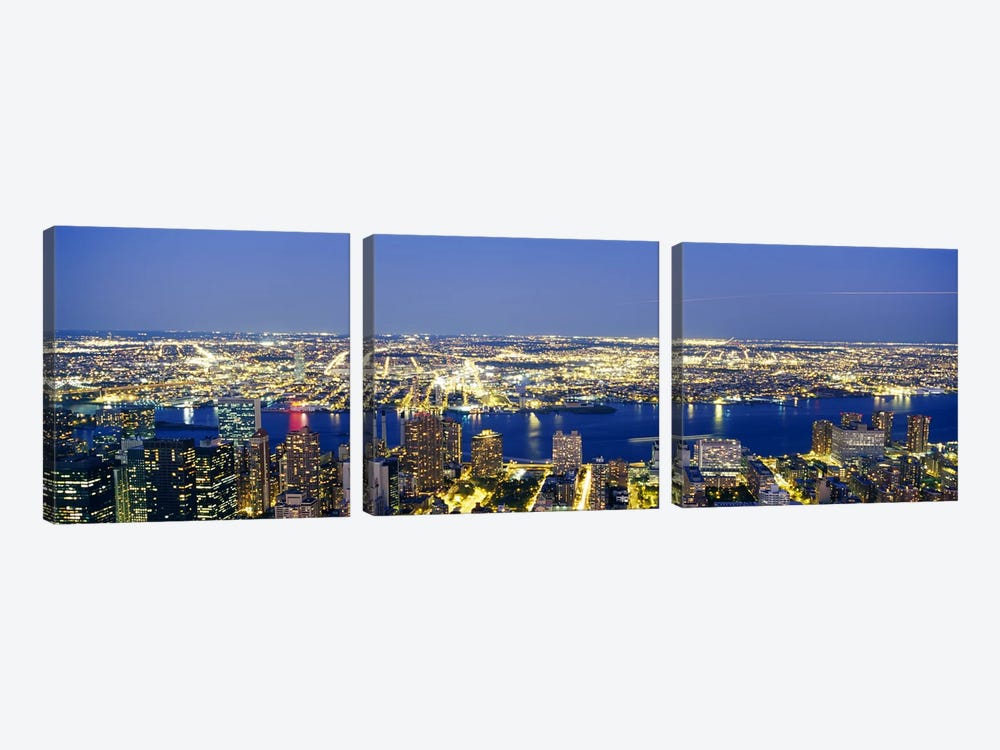 Aerial View of Buildings Lit Up At Dusk Manhattan, NYC, New York City, New York State, USA by Panoramic Images 3-piece Canvas Print