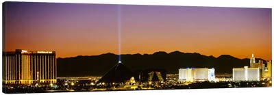 Buildings in a city lit up at night, Las Vegas, Nevada, USA Canvas Art Print - Pyramids
