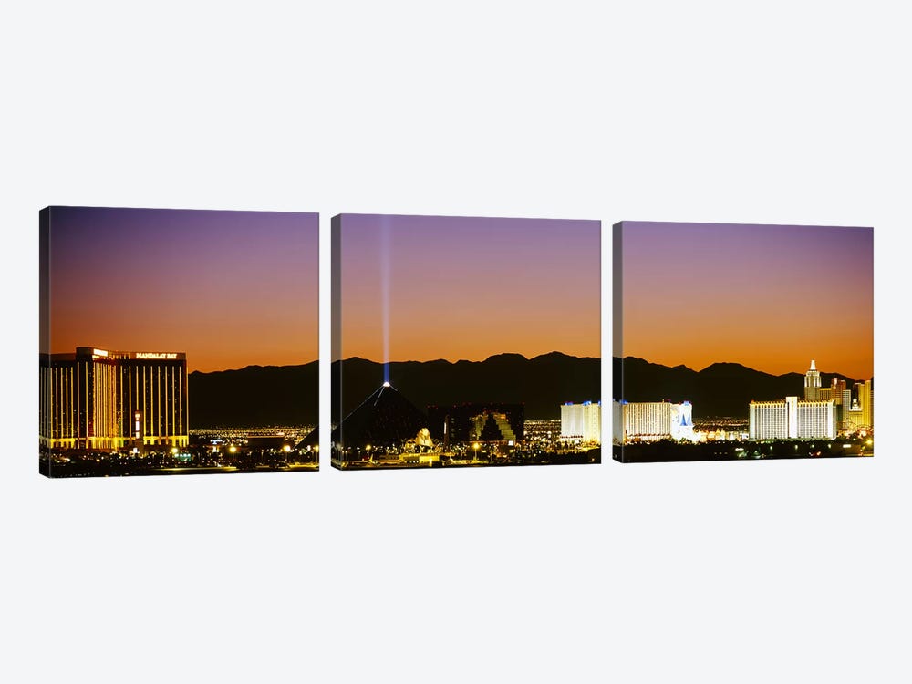 Buildings in a city lit up at night, Las Vegas, Nevada, USA by Panoramic Images 3-piece Canvas Print