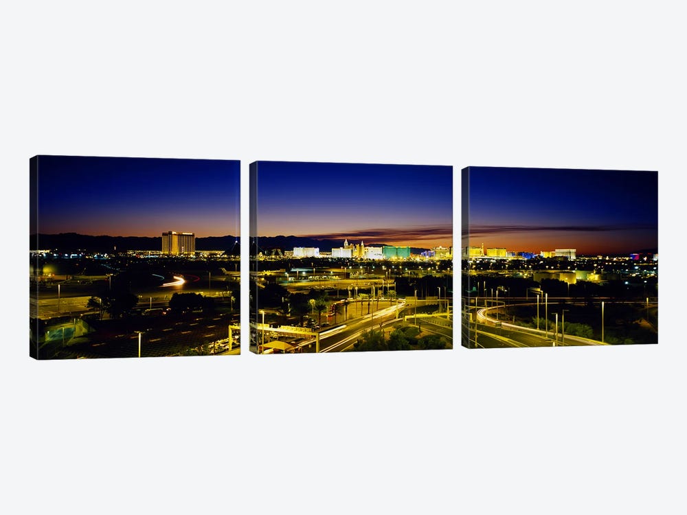High angle view of buildings lit up at dusk, Las Vegas, Nevada, USA by Panoramic Images 3-piece Canvas Art Print