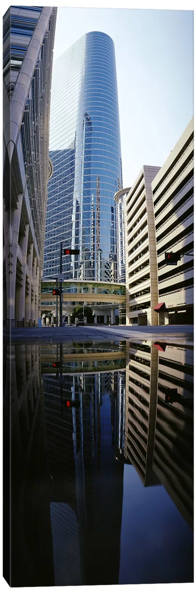 Reflection of buildings on water, Houston, Texas, USA Canvas Art Print - Texas Art