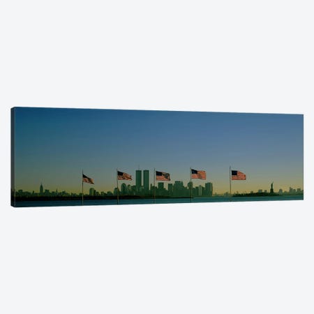 View Of Manhattan Through A Row Of American Flags At Flag Plaza, Liberty State Park, New Jersey Canvas Print #PIM3703} by Panoramic Images Canvas Print