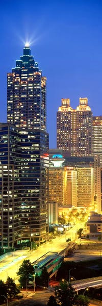 Georgia: Skyscrapers lit up at night, Atlanta, Georgia, USA by Panoramic Images