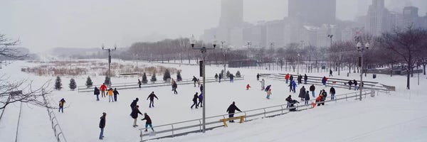 Chicago Skylines: Group of people ice skating in a park, Bicentennial Park, Chicago, Cook County, Illinois, USA by Panoramic Images