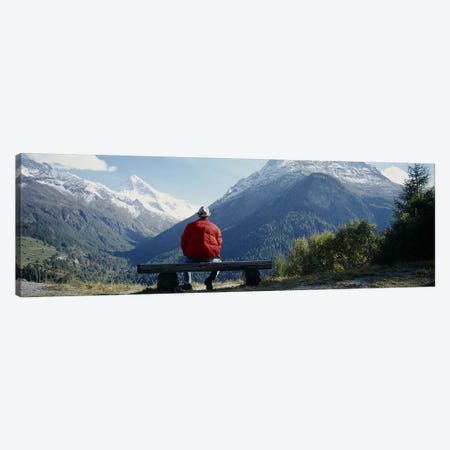 Hiker Contemplating Mountains Switzerland Canvas Print #PIM3802} by Panoramic Images Canvas Wall Art
