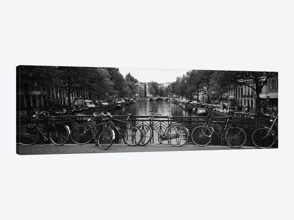 Bicycle Leaning Against A Metal Railing On A Bridge, Amsterdam, Netherlands by Panoramic Images 1-piece Canvas Artwork