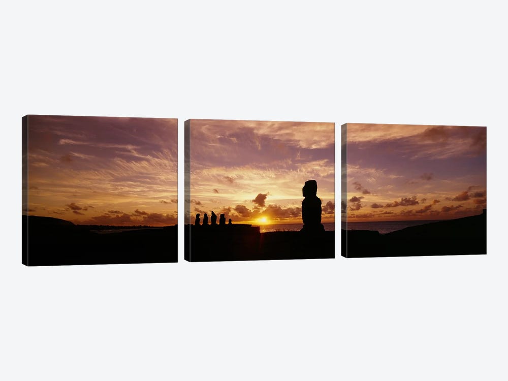 Silhouette of Moai statues at dusk, Tahai Archaeological Site, Rano Raraku, Easter Island, Chile by Panoramic Images 3-piece Canvas Print