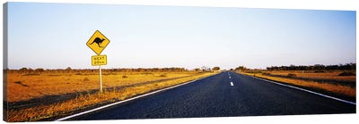 Kangaroo Crossing Sign Along A Highway, New South Wales, Australia Canvas Art Print - New South Wales Art