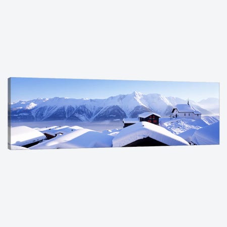 Snow Covered Chapel and Chalets Swiss Alps Switzerland Canvas Print #PIM3872} by Panoramic Images Canvas Art Print