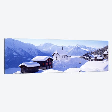 Snow Covered Chapel and Chalets Swiss Alps Switzerland Canvas Print #PIM3873} by Panoramic Images Canvas Print