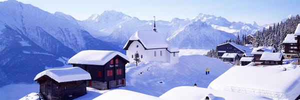Switzerland: Snow Covered Chapel and Chalets Swiss Alps Switzerland by Panoramic Images