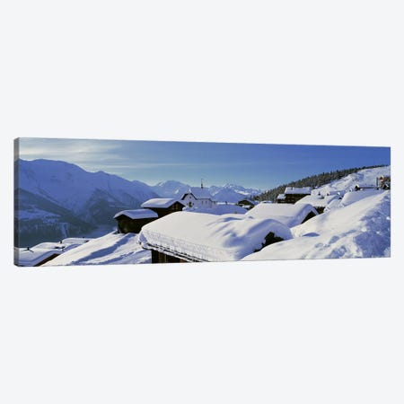 Snow Covered Chapel and Chalets Swiss Alps Switzerland Canvas Print #PIM3874} by Panoramic Images Canvas Wall Art