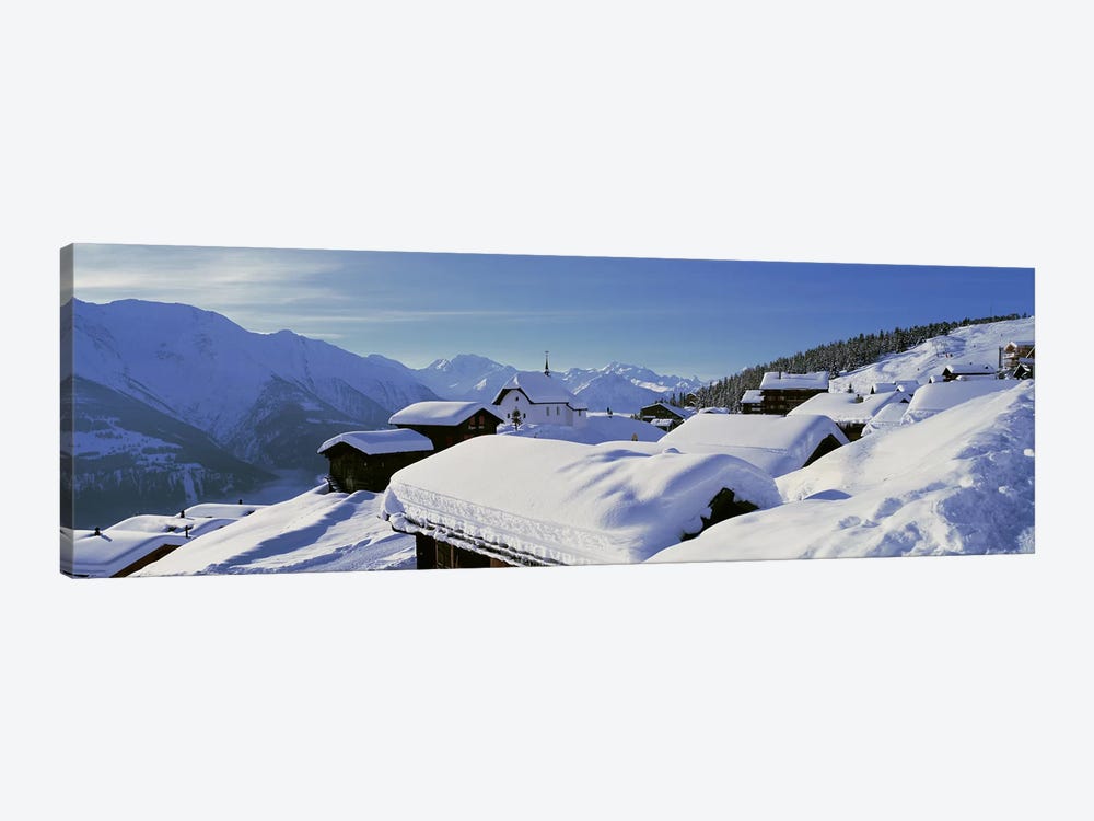 Snow Covered Chapel and Chalets Swiss Alps Switzerland by Panoramic Images 1-piece Canvas Wall Art