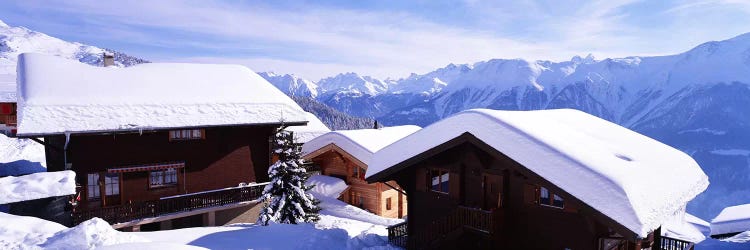 Snow Covered Chapel and Chalets Swiss Alps Switzerland