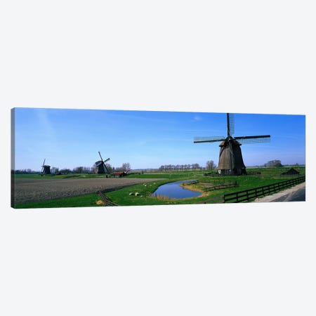 Windmills near Alkmaar Holland (Netherlands) Canvas Print #PIM3904} by Panoramic Images Canvas Artwork