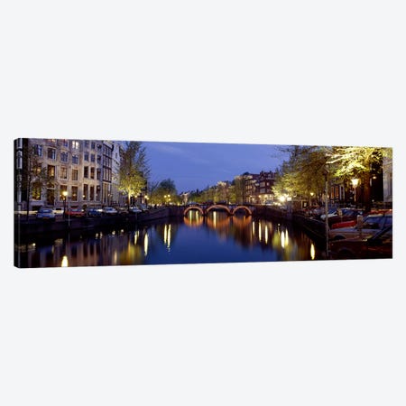 Night View Along Canal Amsterdam The Netherlands Canvas Print #PIM3927} by Panoramic Images Canvas Wall Art