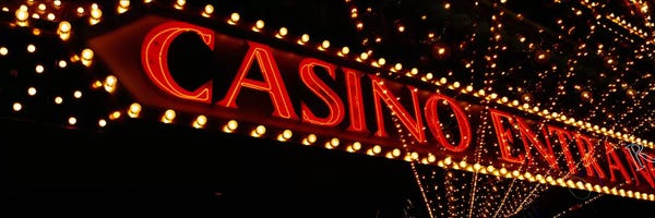 Gambling: Low angle view of neon signLas Vegas, Nevada, USA by Panoramic Images