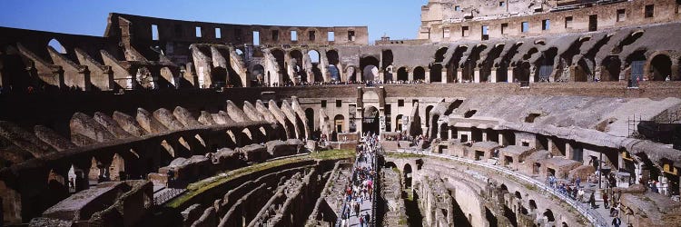 High angle view of tourists in an amphitheater, Colosseum, Rome, Italy